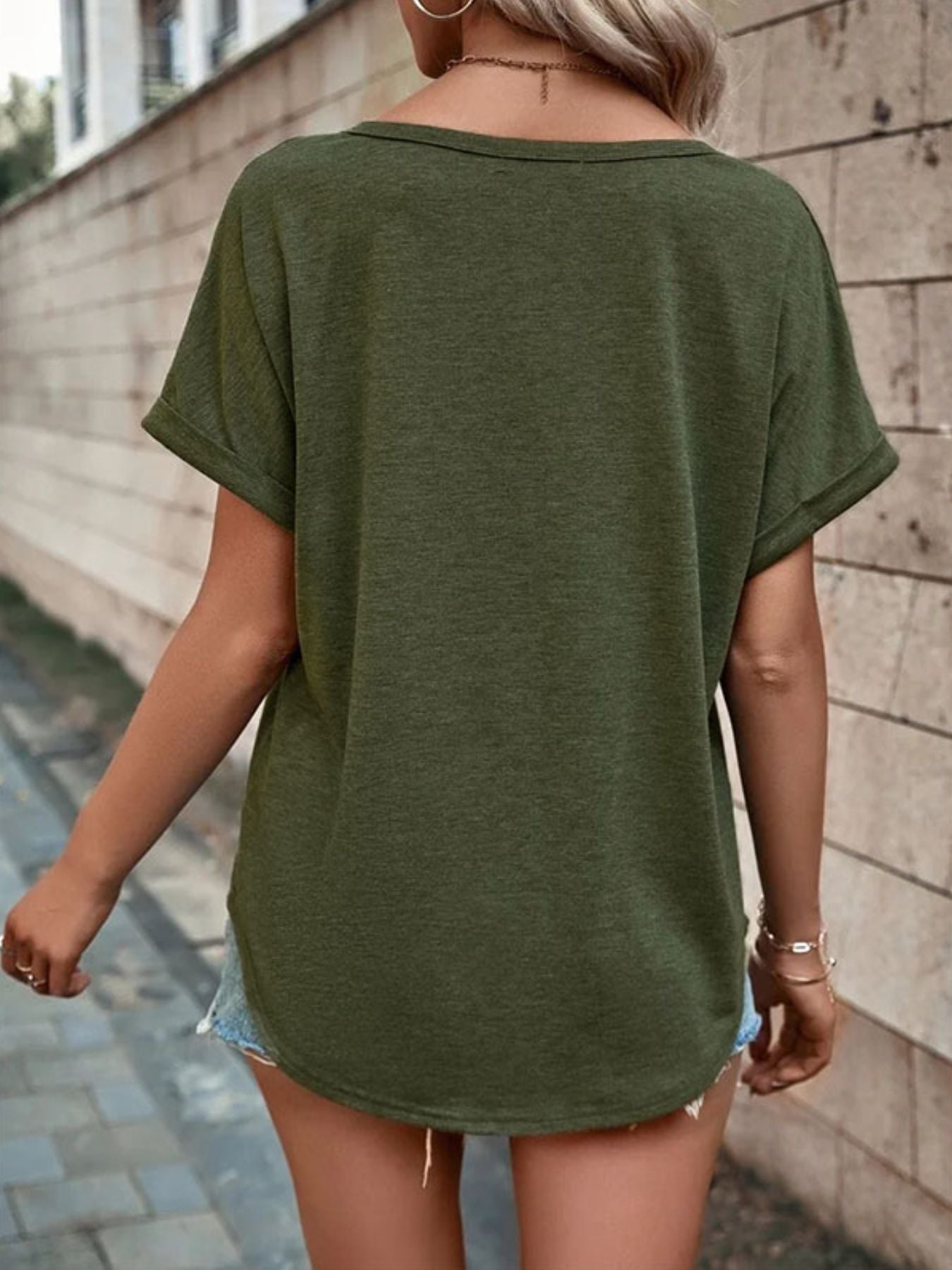 Plus size short sleeve t-shirt with full size decor button and slight stretch polyester blend