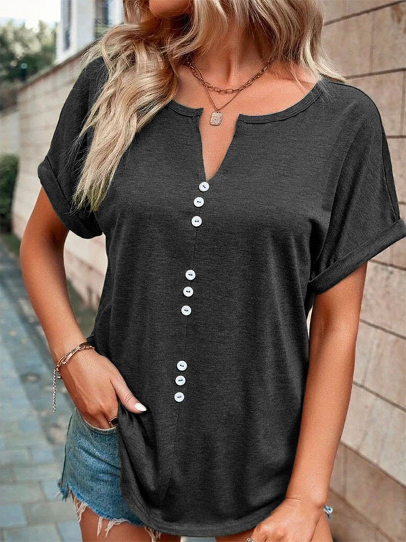 Plus size short sleeve t-shirt with full size decor button detail and slight stretch